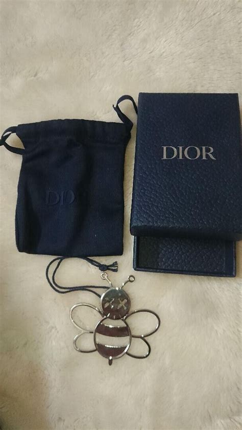 dior kaws charm|KAWS Dior reddit.